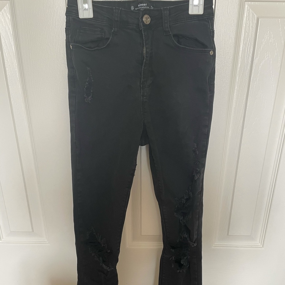 Distressed high rise sinner jeans